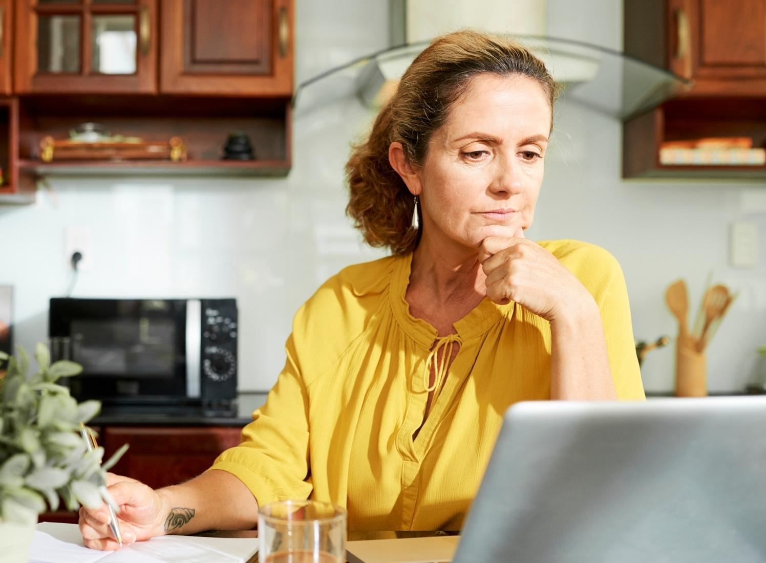 Man balancing checkbook